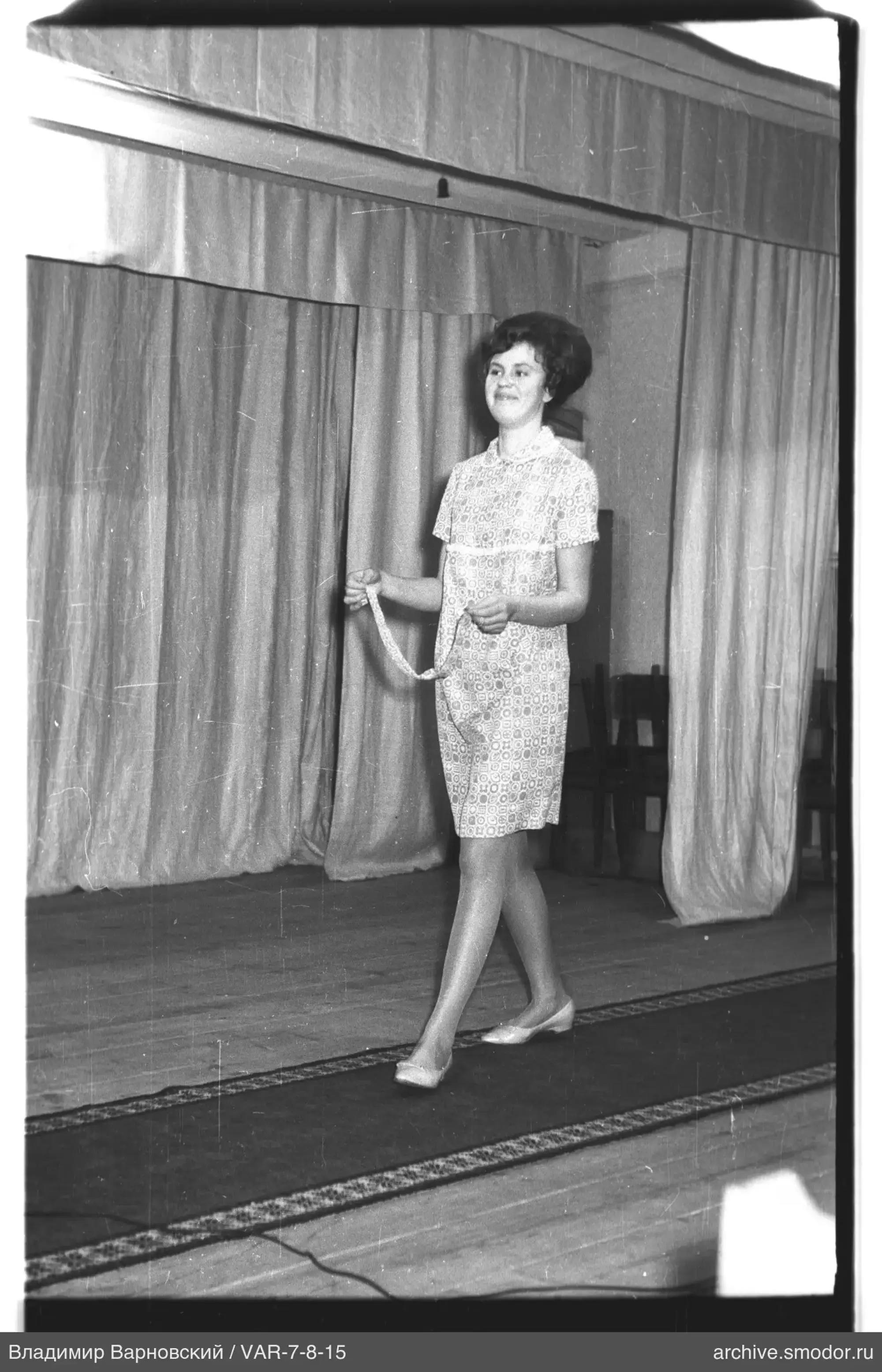 Woman in a short patterned dress