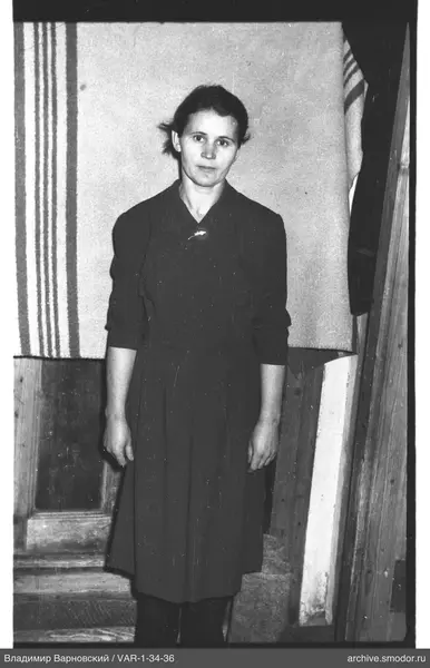 Portrait of a woman in a dark dress
