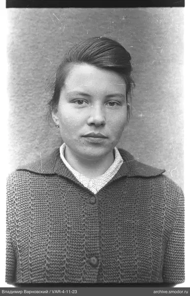 Portrait of a woman in a knitted cardigan