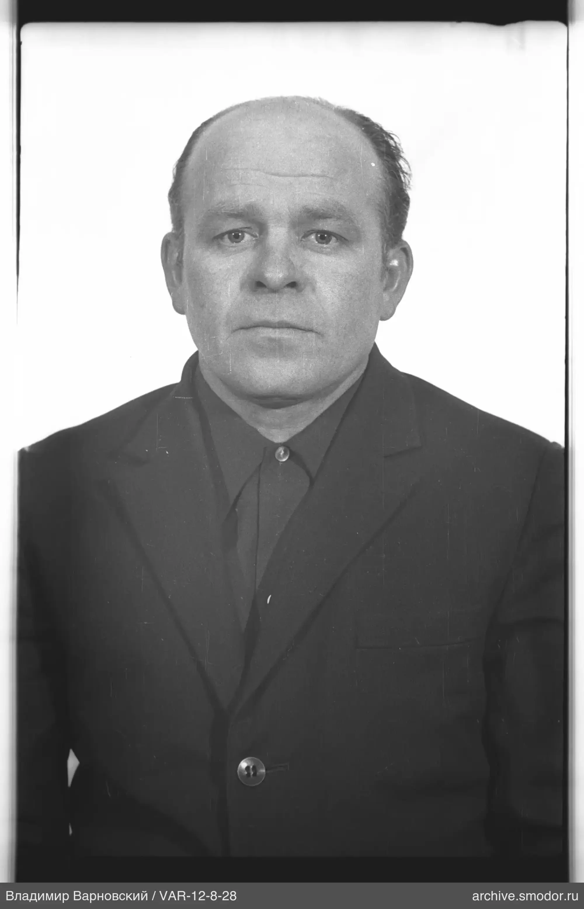 Портрет лысеющего мужчины