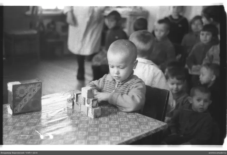 Boy stacking wooden blocks