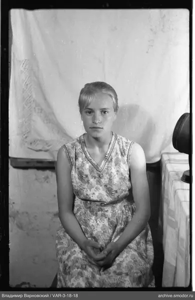 Portrait of a woman in a light dress