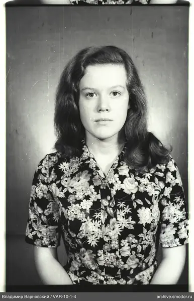 Portrait of a woman in a floral shirt