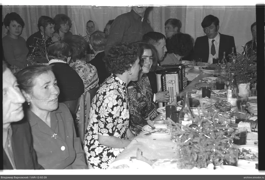 Men and women at a festive table