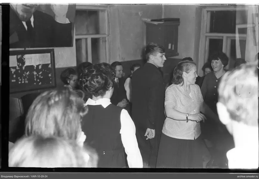 Group of people in a room with portrait