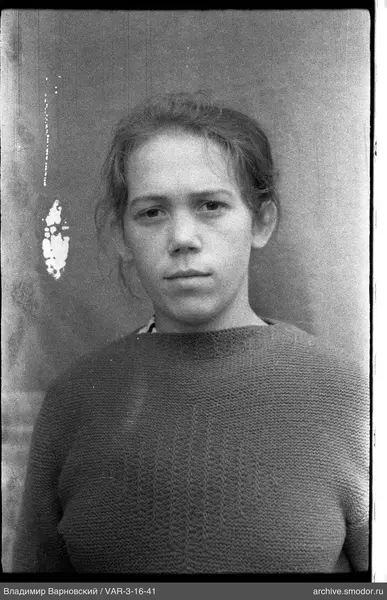 Portrait of a woman in a dark sweater