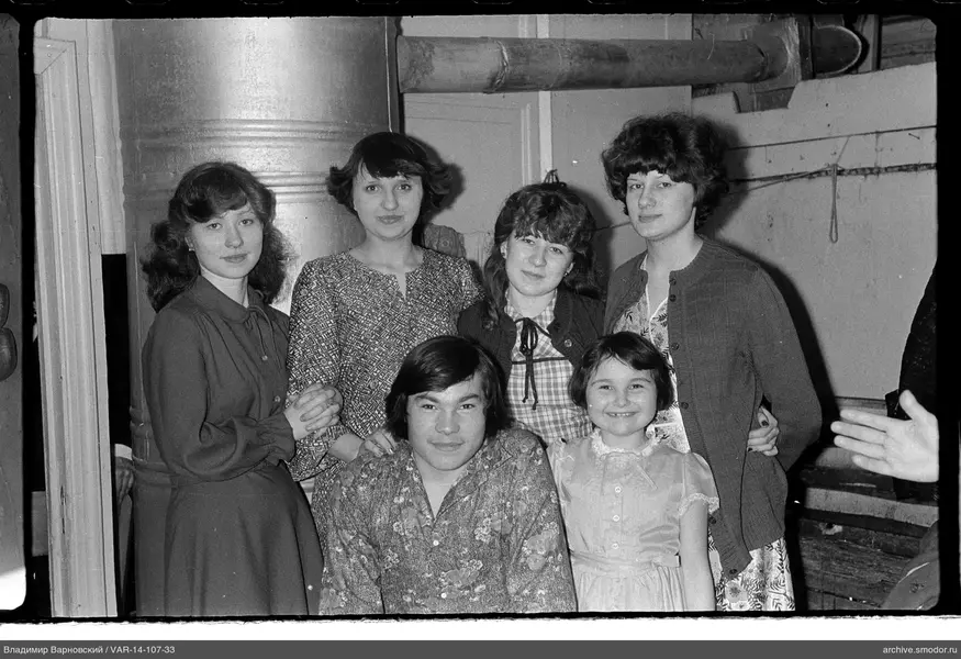 Group portrait of women and man