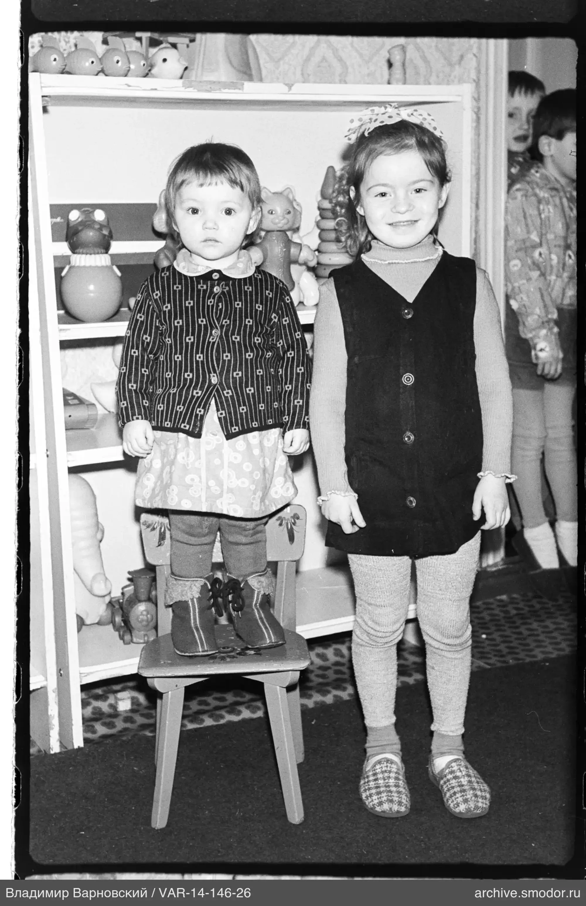 Group of children with toys and in pajamas
