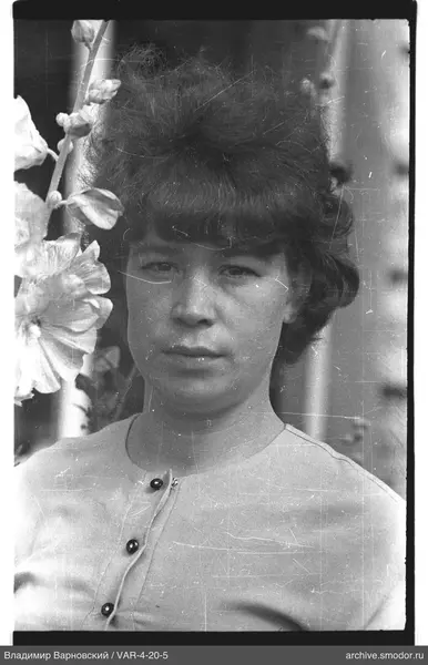 Portrait of a woman with flowers and vertical background elements