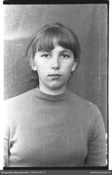 Portrait of a woman in a light sweater