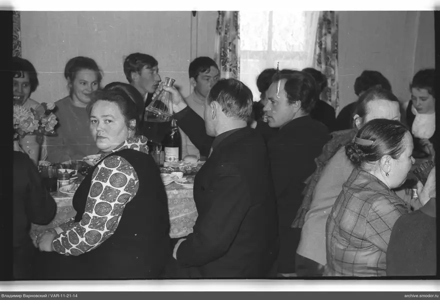 Group of people at a table with drinks