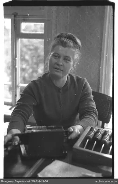 Portrait of a woman with an object and abacus