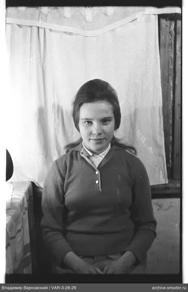 Portrait of a woman in a dark sweater
