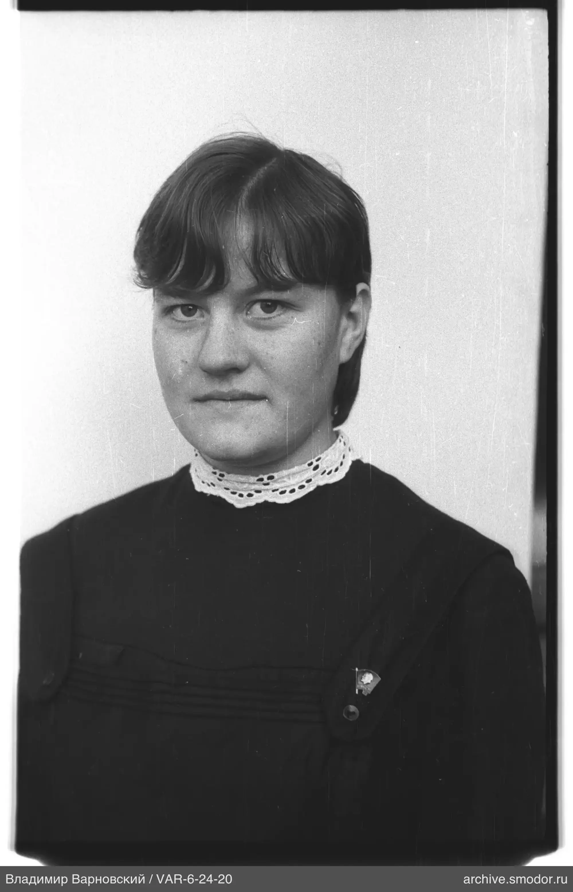 Portrait of a woman in a dark dress