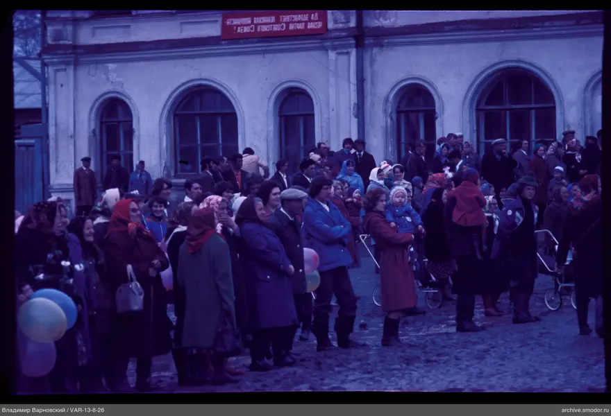 Group of people in front of arched windows