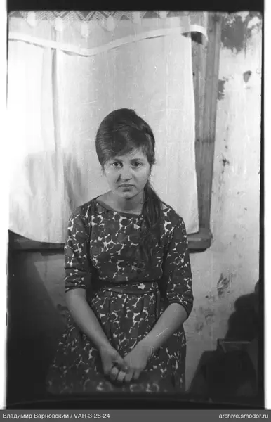 Portrait of a woman in a patterned dress