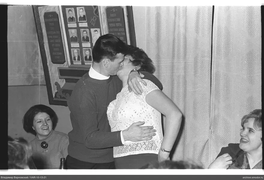 Embracing couple at event