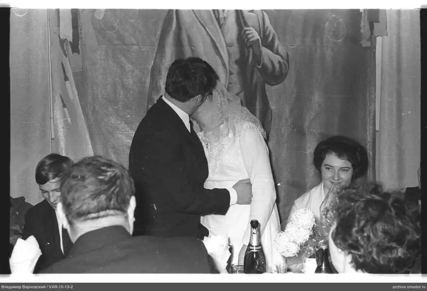 Kissing couple at an event