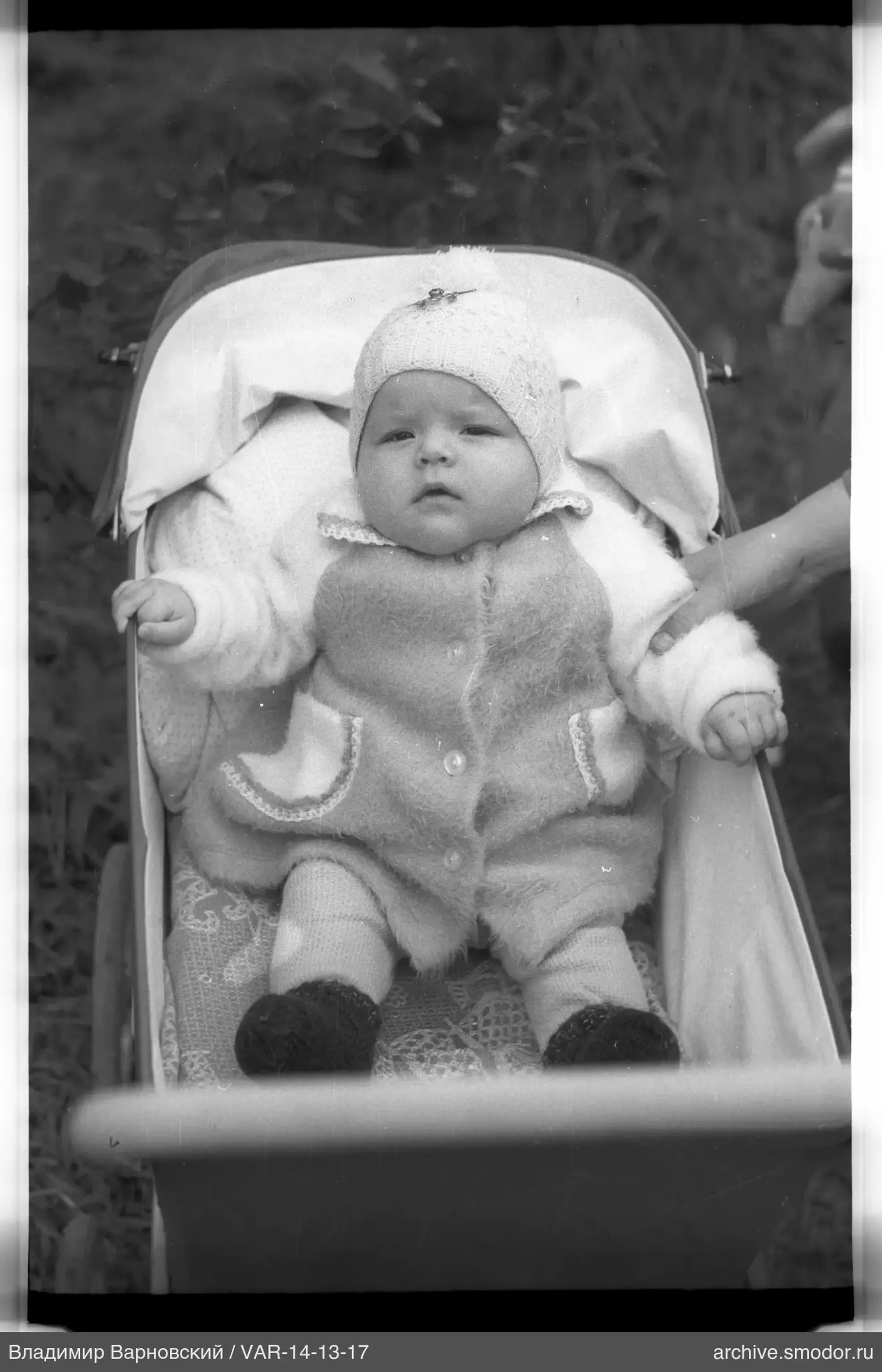 Kind im Kinderwagen
