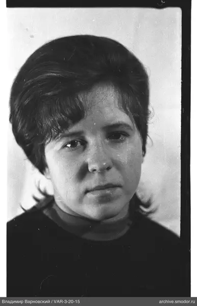 Portrait of a woman with short dark hair