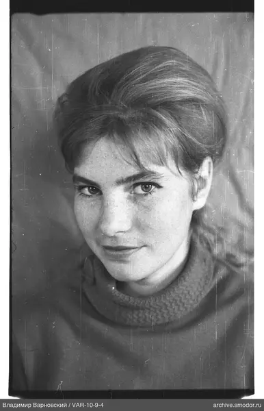 Portrait of a woman with short light hair
