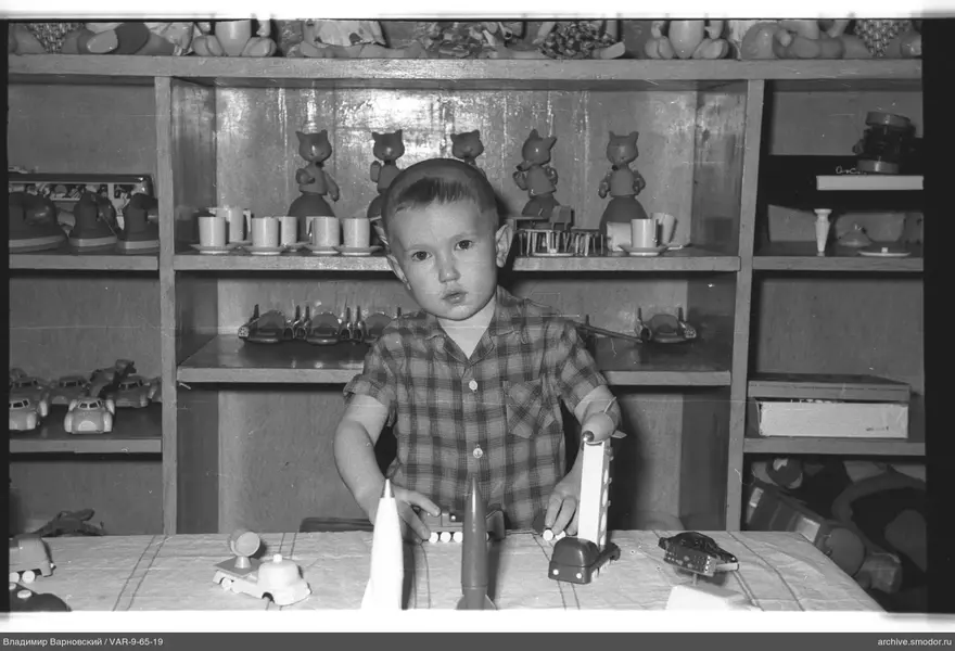 Child with toys and toy rockets