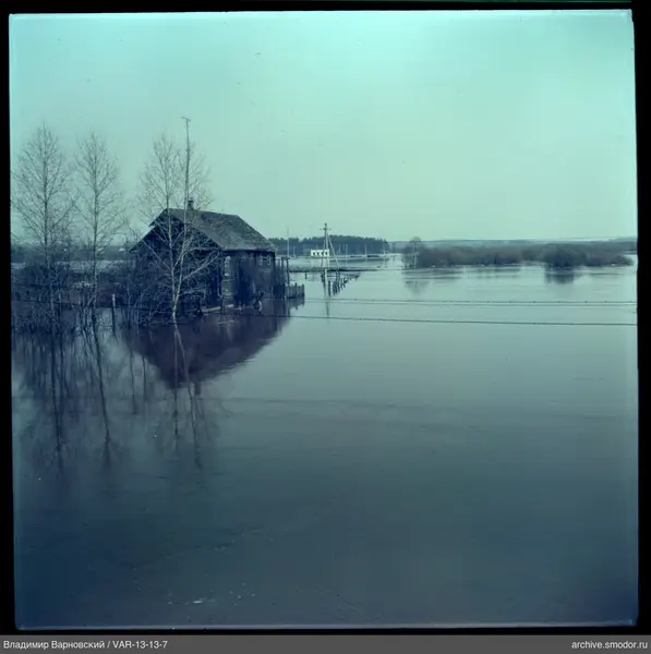 Wooden house in flooded area