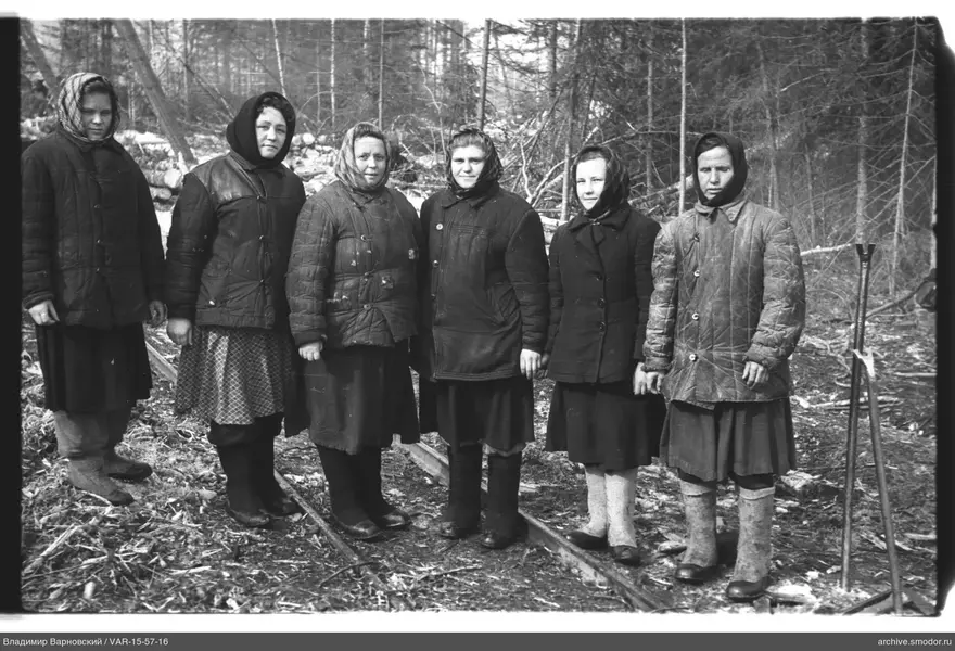 Group women portrait on railway tracks in forest