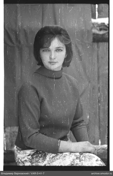 Portrait of a woman in a dark sweater