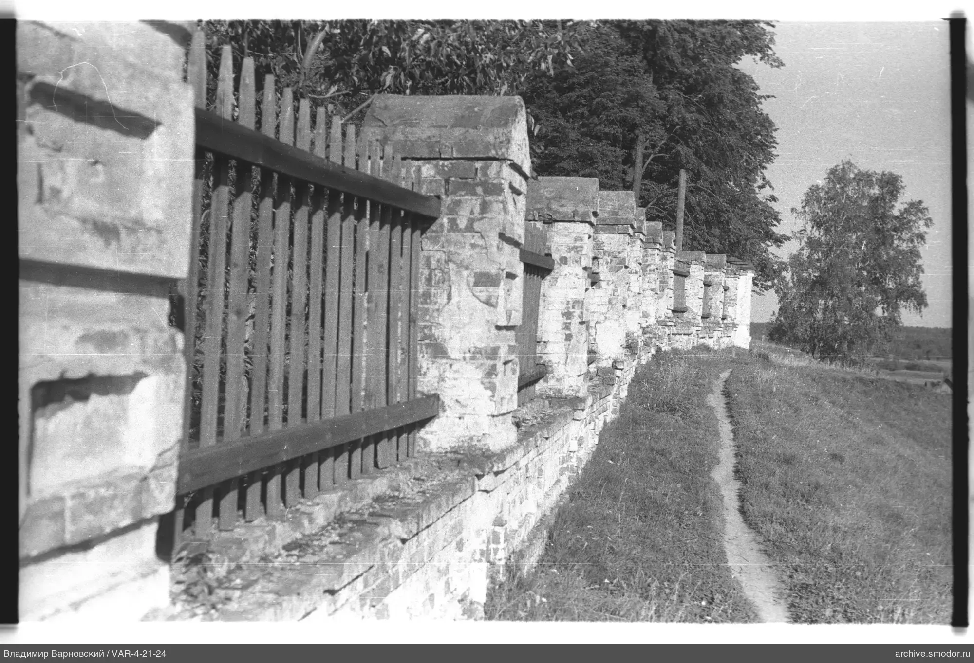 Stone fence along a path