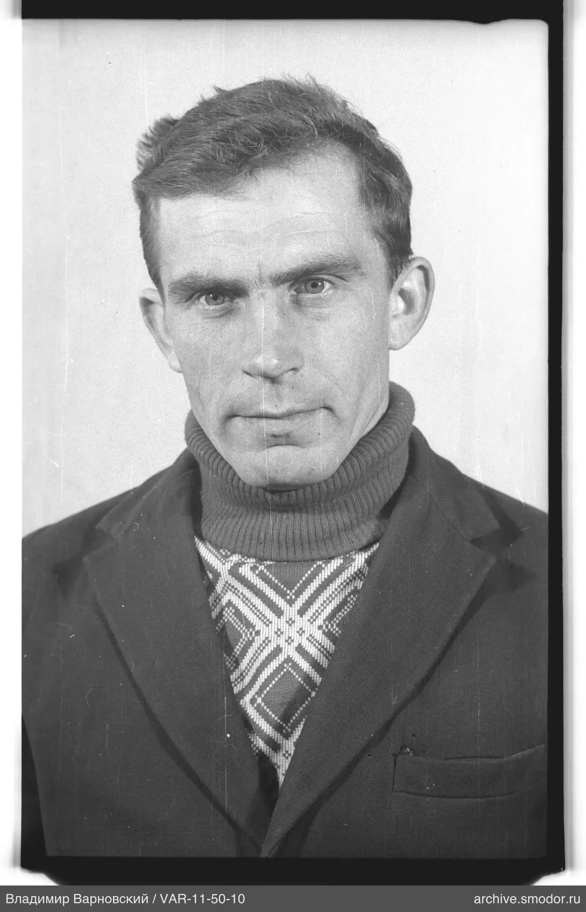 Portrait of a man in a dark jacket