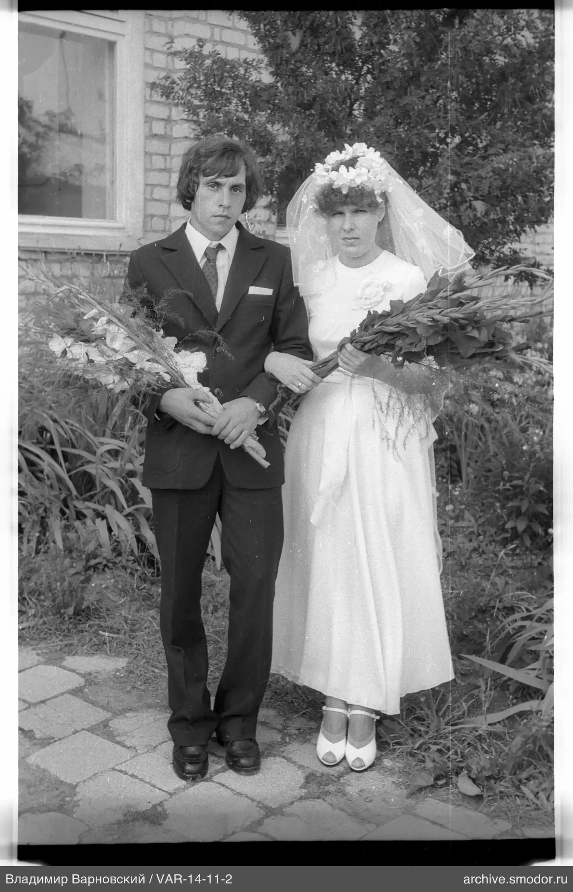 Full-length portrait of a man and woman