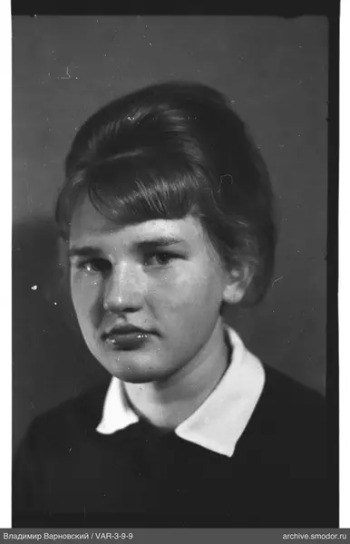 Bust portrait of a woman with dark clothing