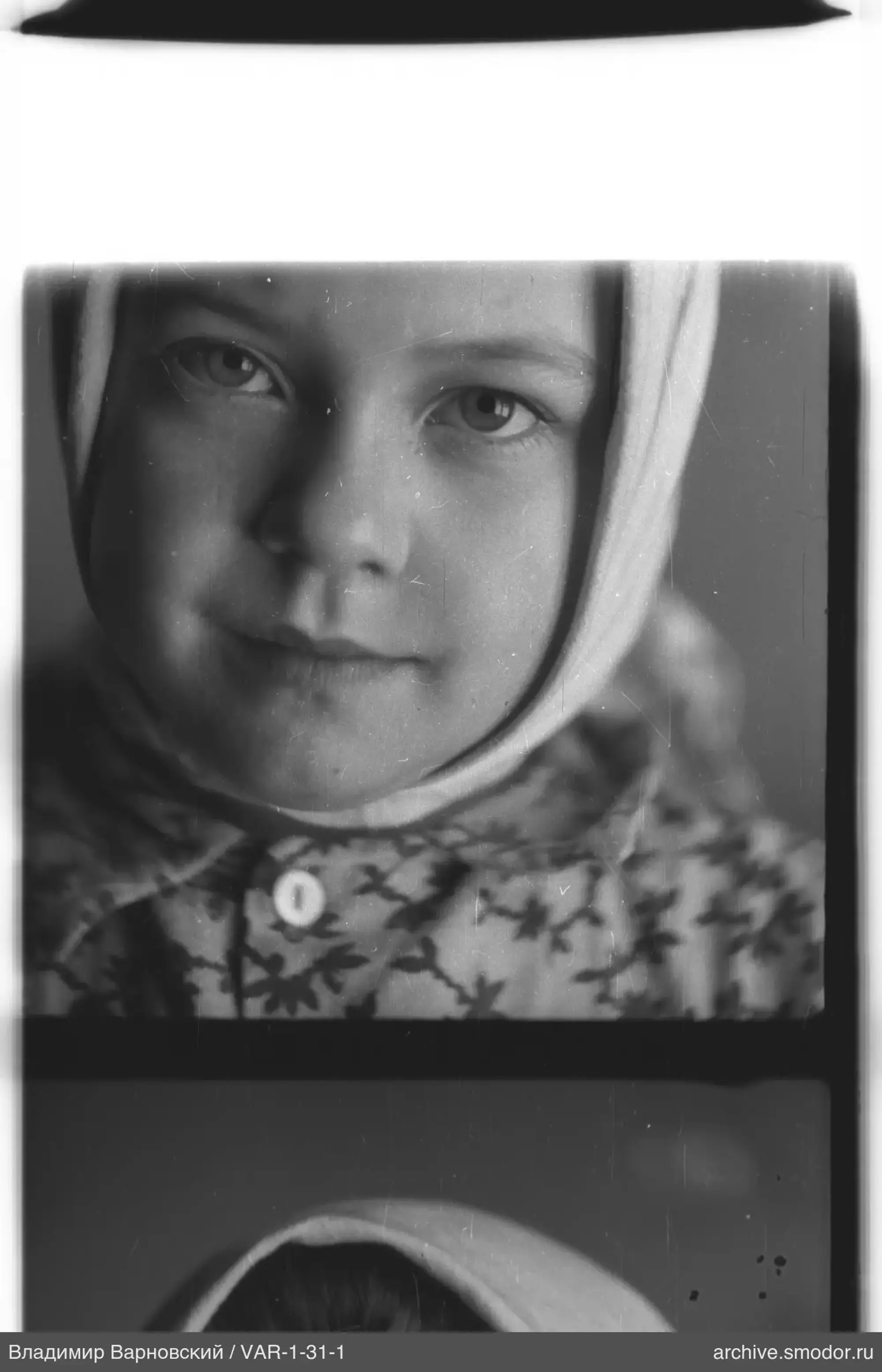 Child portrait in headscarf