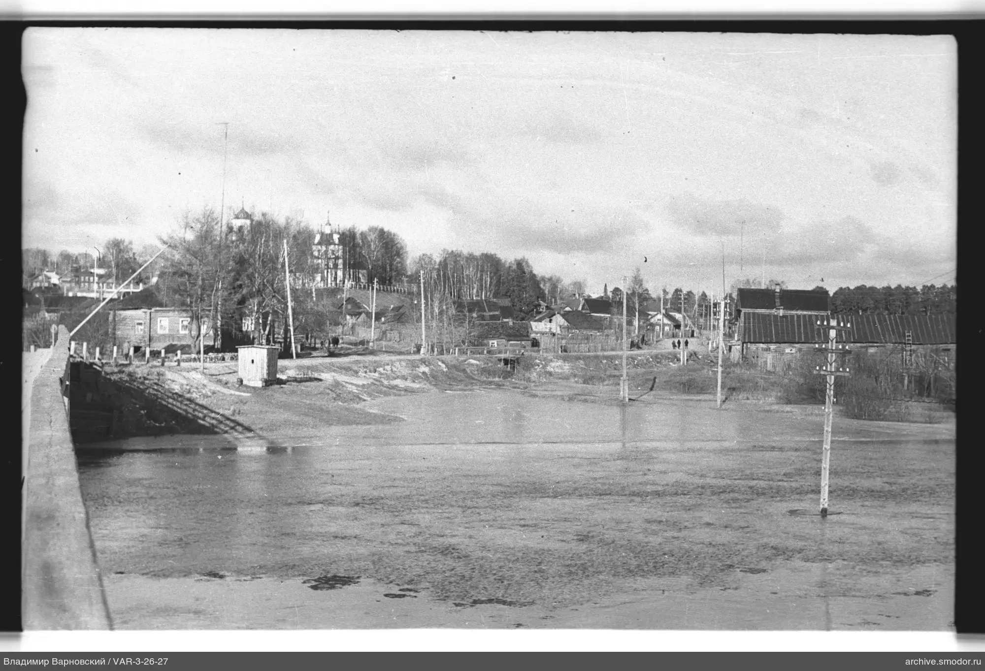 View of river with submerged power line poles