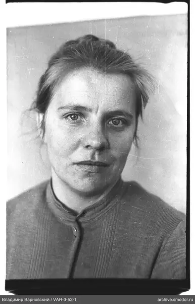 Portrait of a woman in a light sweater